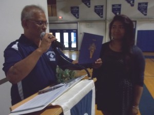 Worshipful Master Isaias Vargas presenting one of Mount Moriah Lodge's Scholarships to Ms. Delos Santos of Basic High School. Ms. Delos Santos will study at UNLV.