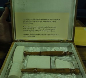 Gavels inside the original box with a card explaining the origin of the stone.