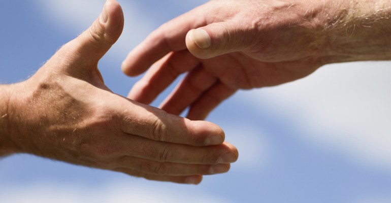 Two hands reaching out