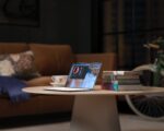 laptop on brown wooden table